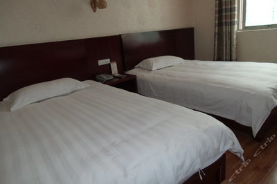 玛格酒店 两大精选房型住宿套餐，尊享专业服务与免费宽带，开启完美旅程